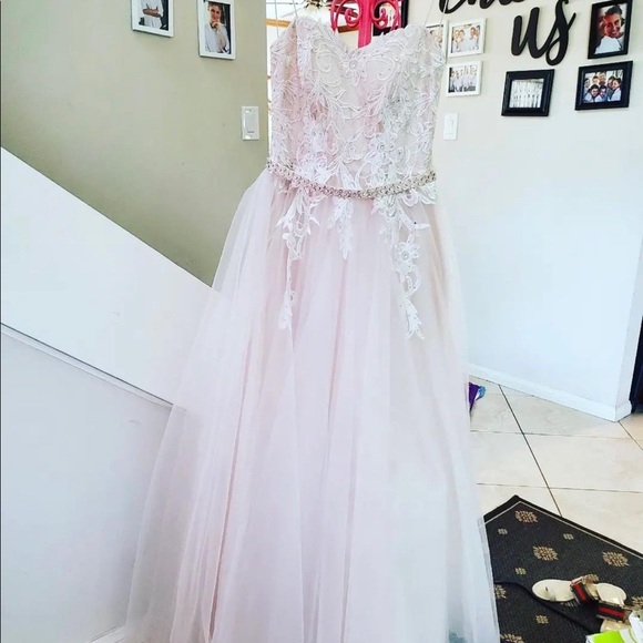 Beautiful sheer white with hints of pink prom dress never worn. Size 4 - Picture 10 of 15